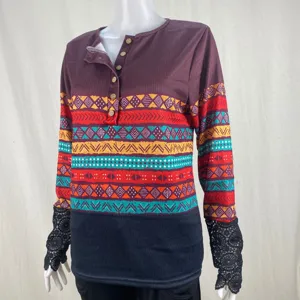 Long sleeve ribbed Henley t-shirt for women featuring geometric aztec print and black lace cuffs.