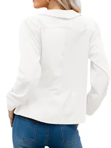 Women casual white blazer jacket long sleeve lapel outerwear paired with blue denim jeans.