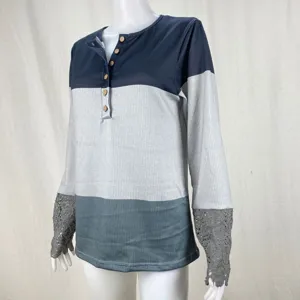 Colorblock long sleeve ribbed henley t-shirt with delicate lace cuffs and wooden button detail.