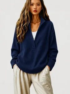 Women's deep V-neck waffle knit sweater, casual long sleeve pullover top for spring and wear.