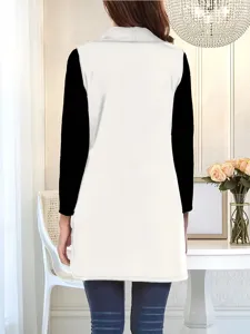Detail shot of the back view of a solid color sleeveless shawl vest in elegant style.