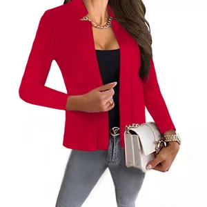 Red open-front blazer detail, collar and sleeve close-up shot showing professional style.