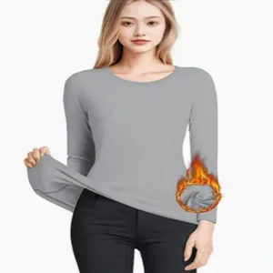 Haut thermique femme manches longues col rond coupe slim pour automne et hiver.