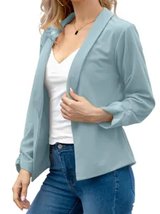 Close-up detail of stylish light blue open-front blazer featuring elegant ruched long sleeves.