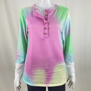 Details of the tie-dye lace cuff henley long sleeve shirt, featuring button placket and rib knit.