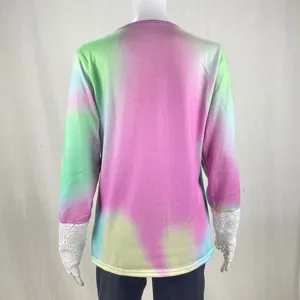 Back view of women tie dye long sleeve t shirt featuring delicate white lace cuffs.