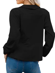 Detailed view of women's black lapel blazer jacket back design, elegant fashion outerwear.