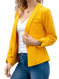 Yellow lapel blazer detail, casual women wear, front view close up of stylish autumn jacket.