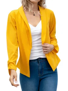 Detail view of the stylish yellow lapel open-front blazer, showing fine fabric and cut.