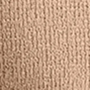 Fabric texture detail close-up of women's autumn blazer suit material, soft and stylish.
