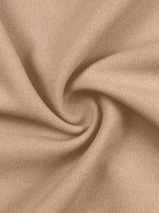 Brown fabric texture detail shot, showing fine material weave, elegant curved drape pattern.