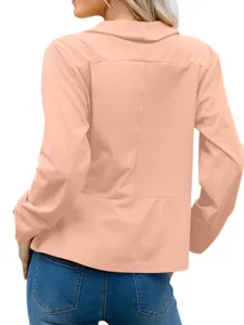 Back view detail of women solid color lapel blazer jacket showing tailored back seam design.