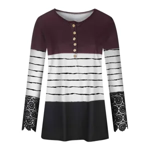 Women's long sleeve colorblock henley t-shirt with striped print and delicate lace cuffs.