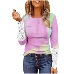 Detailed view of women's long sleeve ribbed top with lace splicing and front buttons.