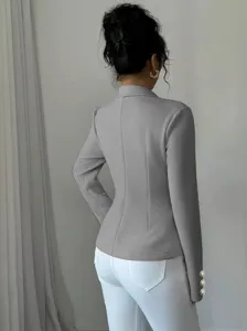Elegante blazer de traje slim fit con solapa y manga larga gris para mujer moda chic.