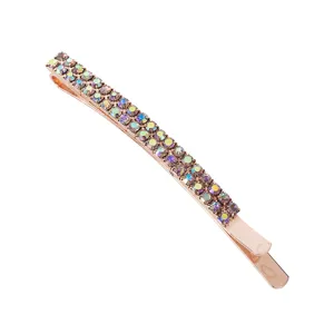 Gedetailleerd overzicht van een elegante roségouden haarspeld met strasssteentjes.