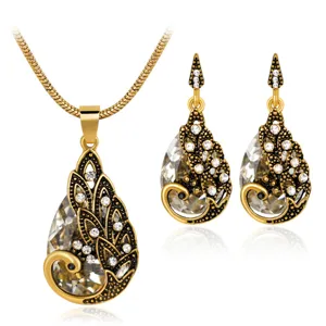 Set collana orecchini pavone cristallo strass dorato gioielli moda donna elegante