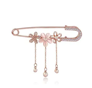 Elegante Roségold Sicherheitsnadel Brosche mit Katzenauge Blumen und funkelnden Kristallen.