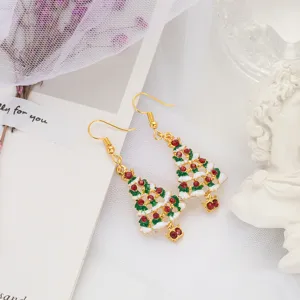 Orecchini pendenti albero di natale dettaglio con tono oro, smalto verde e strass rossi.