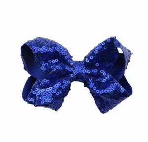 Blauwe pailletten strik haarspeld voor kinderen en volwassenen, glinsterende haarclip detail.
