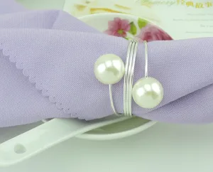 Elegante portasciugamani con perle e anelli a molla argentati per la tua tavola.
