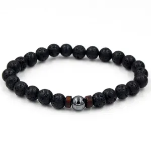 Natuurlijke zwarte vulkanische lavasteen kralenarmband met metalen middenkralen en hout.