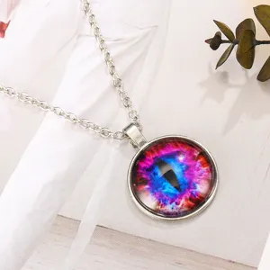 Close-up detail shot of the colorful glass eye pendant necklace with silver chain and gemstone.