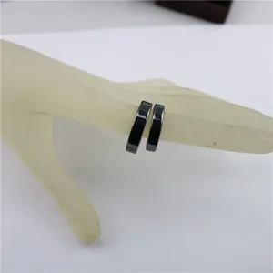 Minimalist black magnetic ring set for men and women stylish jewelry detail view