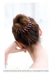 Rhinestone bird's nest hair clip bun maker detail shot showing colorful crystal embellishments.