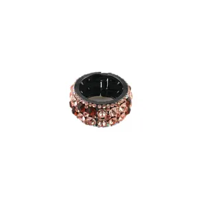 Sparkling rhinestone round hair clip detail shot, elegant ponytail holder for stylish women.