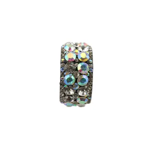 Exquisite rhinestone hair ring detail showing multi-color sparkling crystals on dark base cuff.