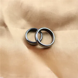 Simple black magnetic hematite rings for men and women, classic smooth design fashion jewelry.
