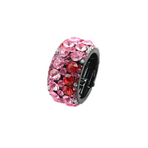 Detailed shot of a round rhinestone ponytail holder with sparkling pink and red crystals.