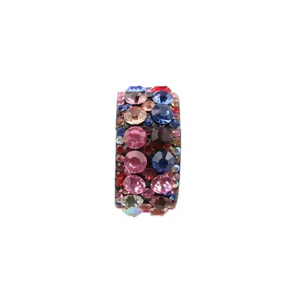 Detailed view of the sparkling rhinestone hair ring, colorful crystal cylinder ponytail buckle.