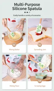 Spatule en silicone avec manche en bois et motif de fruits pour pâtisserie et cuisine.