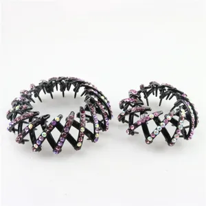 Close-up detail of expandable bird's nest hair clips with sparkling purple rhinestones.