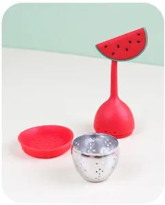 Cute watermelon silicone tea infuser detail view, stainless steel strainer and holder set.