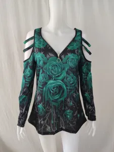 Detail of black long-sleeve top featuring green melting rose print and front zipper V-neck.