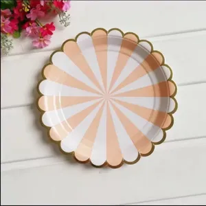 Disposable pink and white striped paper plates with gold foil edges for party celebrations.
