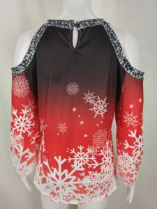 Detail view of the Christmas cold shoulder long sleeve blouse featuring snowflake print.