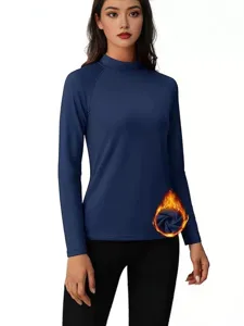 Top térmico de manga larga con cuello alto para mujer ajustado para la temporada de invierno.
