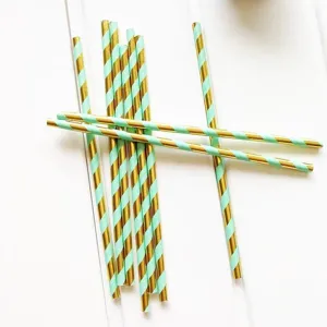 Mint green and gold striped paper straws, perfect for birthday party and festive celebration use.