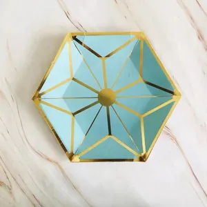 Blue hexagonal gold-foiled paper plate detail, perfect for party tableware and outdoor picnic.