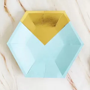 Close-up detail of blue hexagonal paper plate with gold foil top, party tableware.