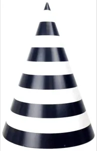Detail shot of the black and white striped paper party hat, perfect for birthday celebrations.