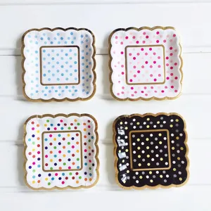Disposable paper plates with gold foil polka dots, square party tableware for cake dessert.