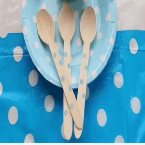 Disposable wooden spoons with blue polka dots, perfect for parties, cakes, and desserts.