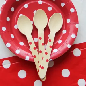 Disposable wooden spoons with red polka dots, perfect for cakes, desserts, and takeout parties.