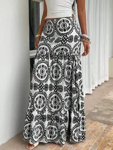 Boho long skirt with black and white print, tiered design, perfect for summer beach and casual wear.