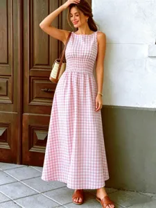 Elegant pink gingham sleeveless long dress with smocked waist, perfect for summer daily wear.